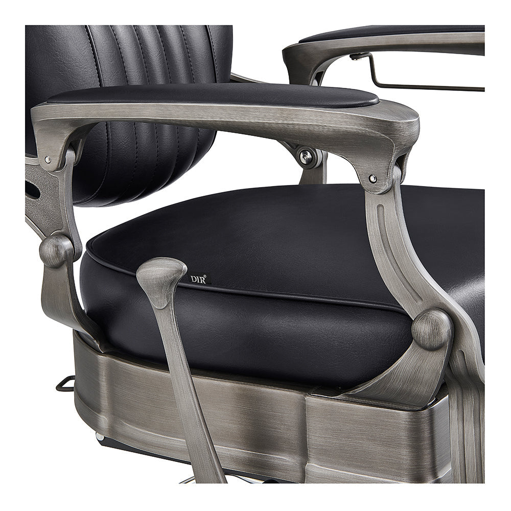 Classic European style barber chair Kaiser showing tufted upholstery and hydraulic base