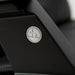 Close-up of Zero Gravity Recliner with 'Human Touch' logo 