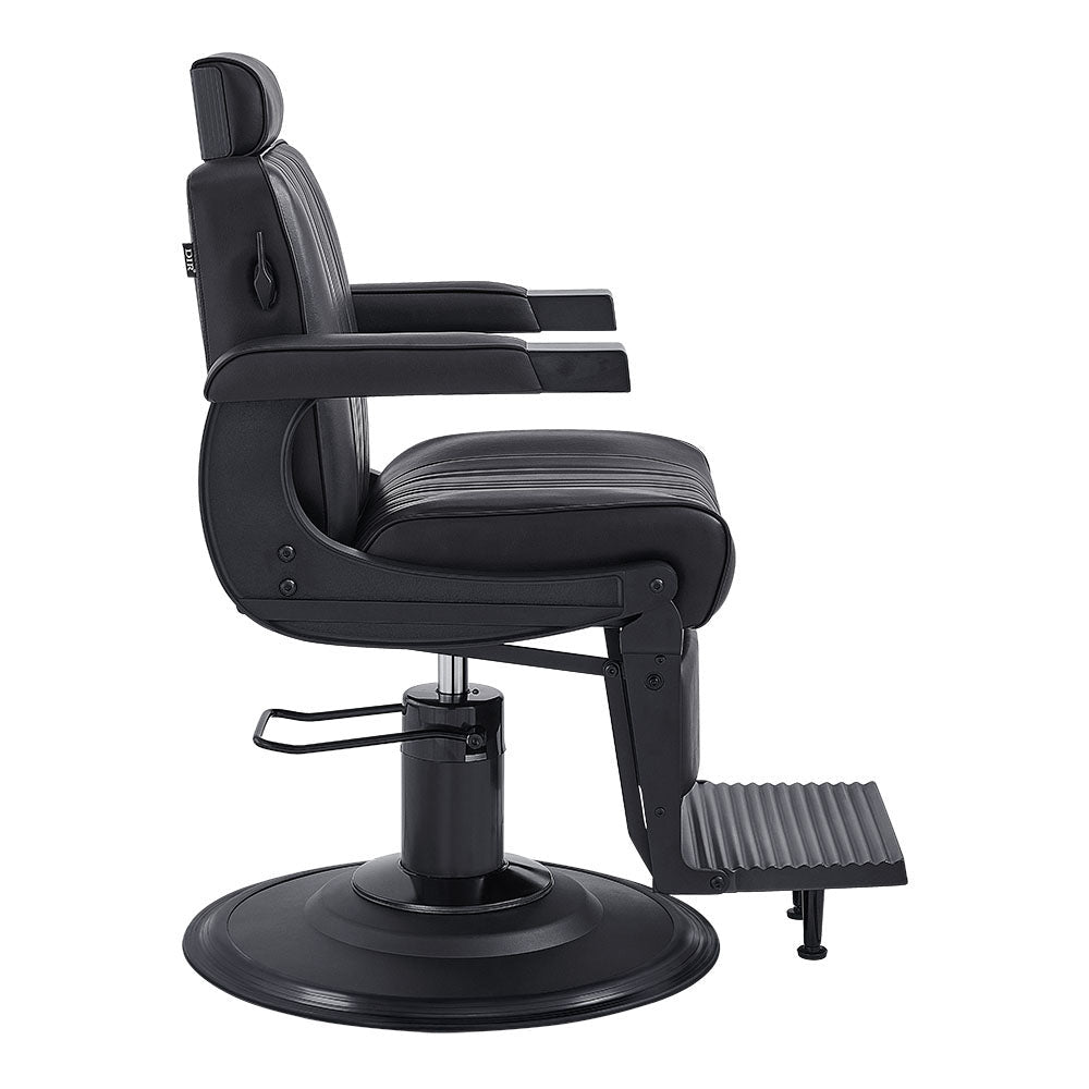 Luxury vintage-style barber chair with chrome base and adjustable headrest