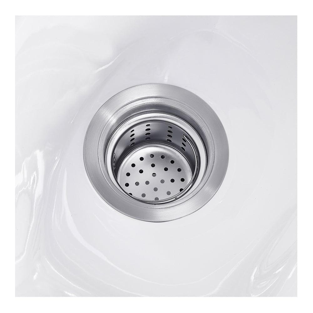 Stainless steel sink drain with vacuum breaker for white ceramic shampoo bowl on salon station